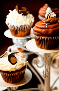 Cupcakes sitting pretty on an elegant stand Image provided by Colette's Catering