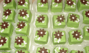 Pretty petit fours are a highlight of the dessert table Image provided by It's All About The Cake