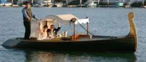 A romantic departure complete with champagne and a singing gondolier. Image provided by Lawrence Crandall Photography - WeddingCompass.com