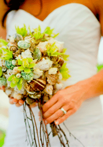 Seashells add a be beachy touch to this bride's bouquet Image provided by Organic Elements Event Design
