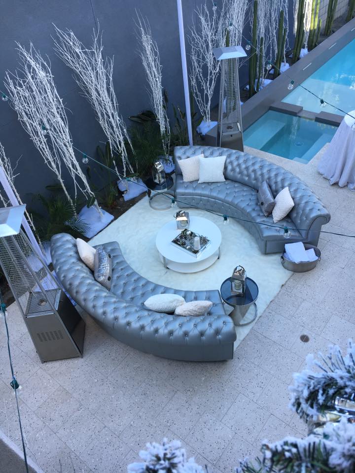 Create a lounge that compliments the season such as this winter design using modern lanterns, with fur rug & pillows that gives that comfy & cozy feel. Consider also providing blankets or pashmina scarves as a little warm up on cold evening. - Kevin Covey - Christine Bentley - Reception Lounge